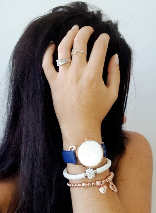 A Stacked Wrist of Mixed Metals Inspired by Interior Design